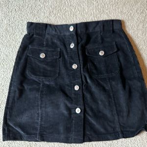 Cute corduroy mini skirt with pockets. Size 10